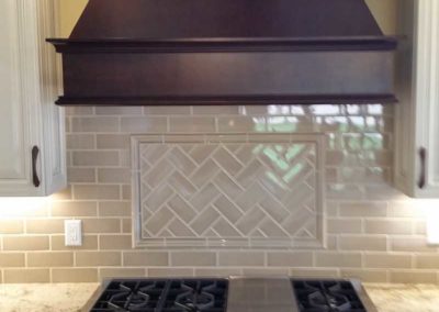 Stove backsplash tiling by Mountaineer Kitchens and Baths