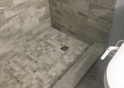 Shower floor with drain by Mountaineer Kitchens & Baths