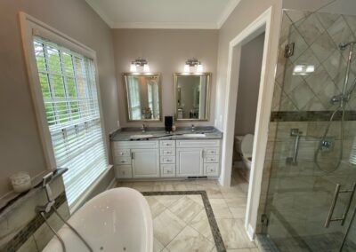 Renovated bathroom by Mountaineer Kitchens & Baths