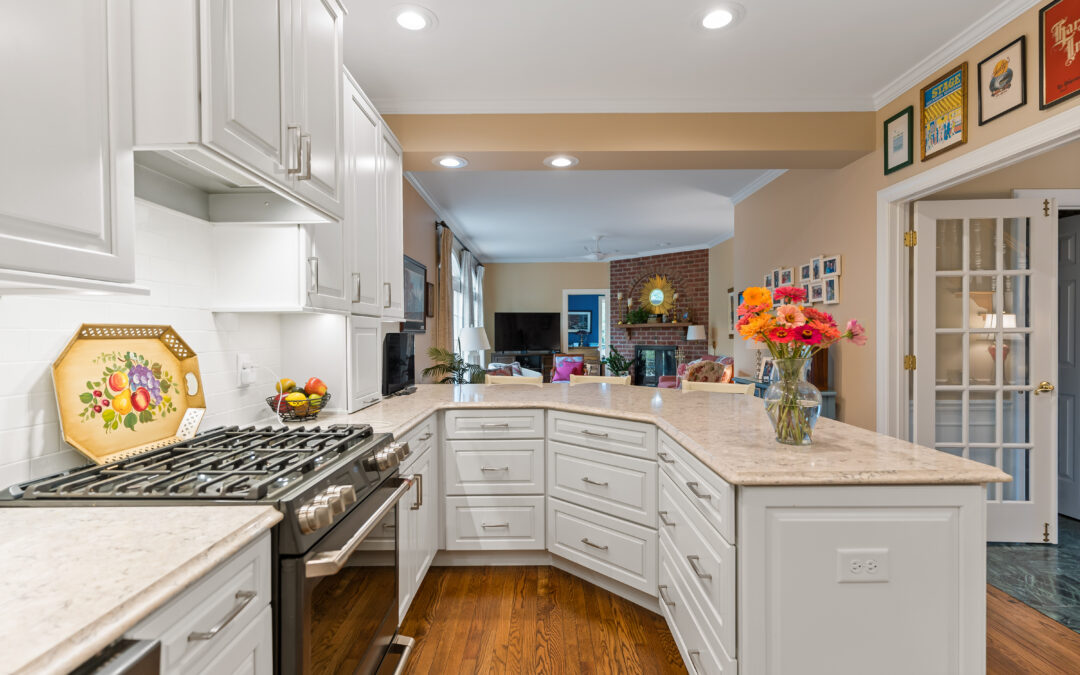 white kitchen island with quartz countertops