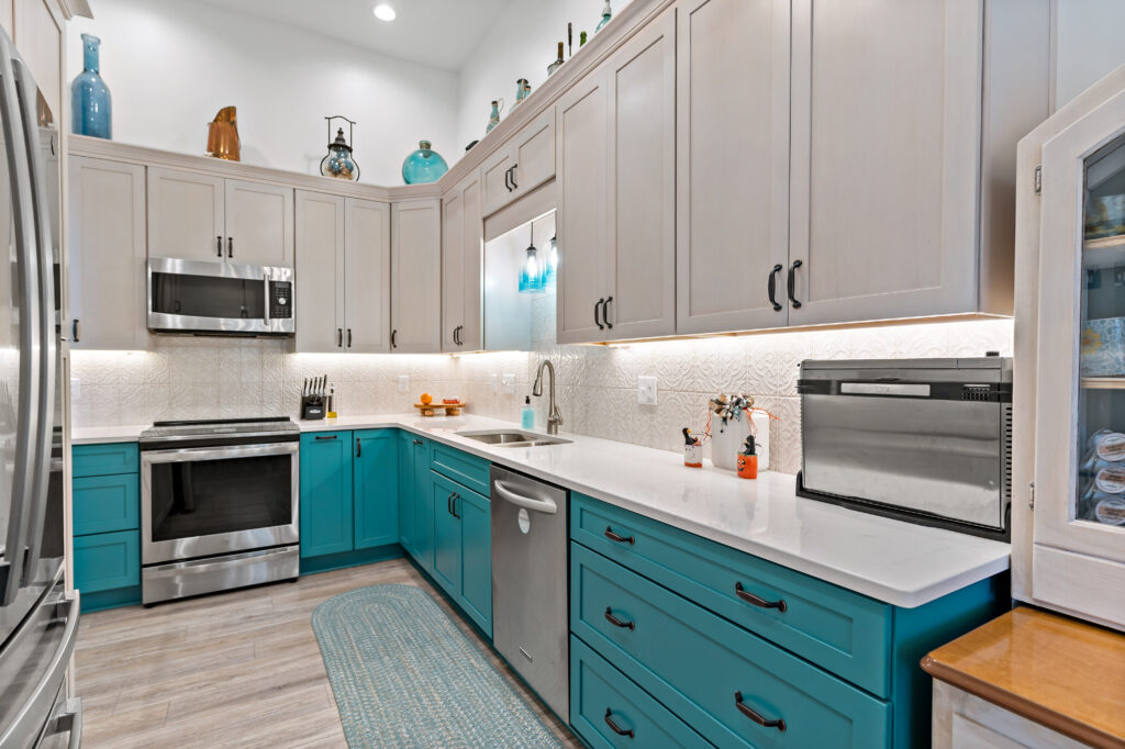 blue kitchen cabinets and quartz countertops