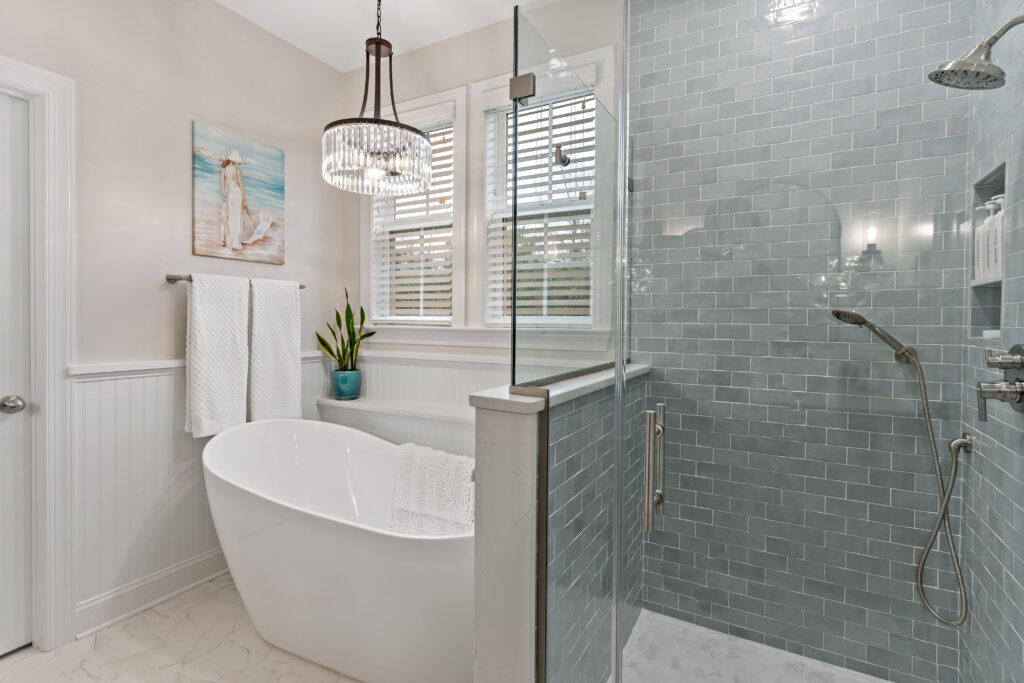 white bathtub with stand up shower