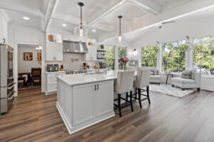 white kitchen island with hardwood floors