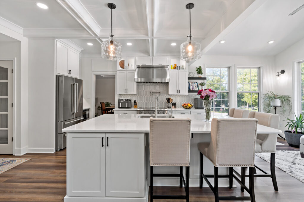 white kitchen island with hardwood floors